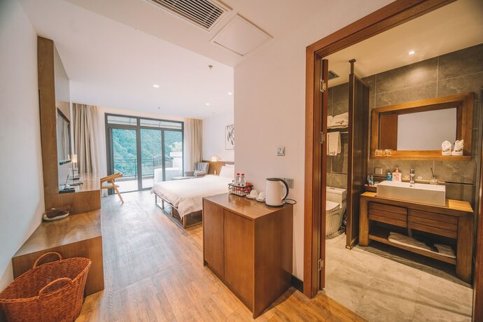 Imagen de la habitación del Hotel Zhangjiajie National Park Nvue Resorts. Foto 14