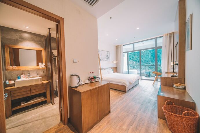Imagen de la habitación del Hotel Zhangjiajie National Park Nvue Resorts. Foto 15