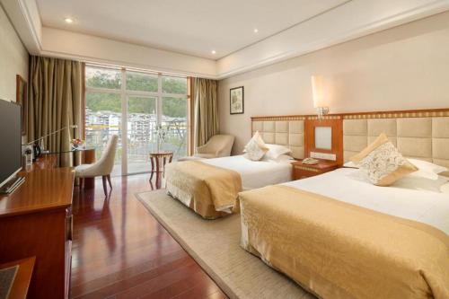 Imagen general del Hotel Zhangjiajie Qinghe Jinjiang International. Foto 9