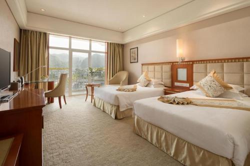 Imagen general del Hotel Zhangjiajie Qinghe Jinjiang International. Foto 14