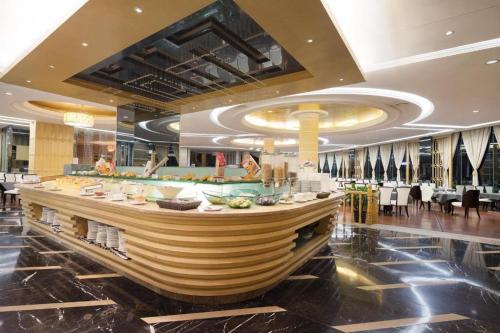 Imagen general del Hotel Zhangjiajie Qinghe Jinjiang International. Foto 19