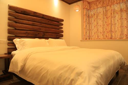 Imagen de la habitación del Hotel Zhangjiajie Shi Guang Zhi Wai Boutique. Foto 2