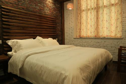 Imagen de la habitación del Hotel Zhangjiajie Shi Guang Zhi Wai Boutique. Foto 3