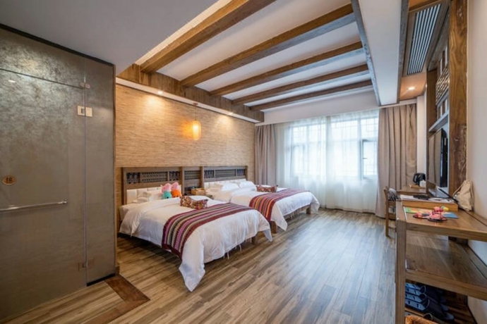 Imagen de la habitación del Hotel Zhangjiajie Xiangruige Boutique. Foto 4