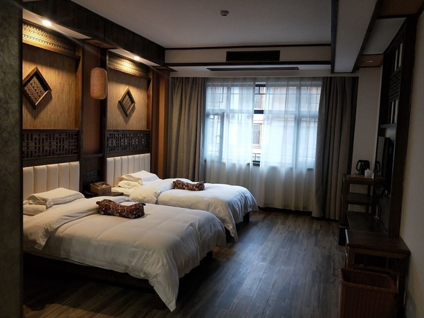 Imagen de la habitación del Hotel Zhangjiajie Xiangruige Boutique. Foto 5