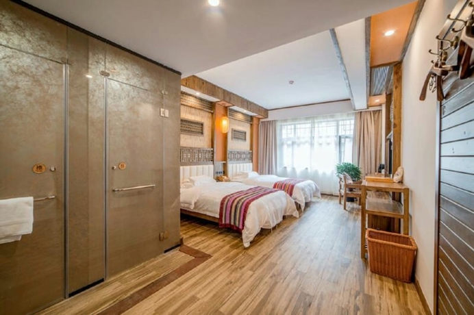 Imagen de la habitación del Hotel Zhangjiajie Xiangruige Boutique. Foto 10