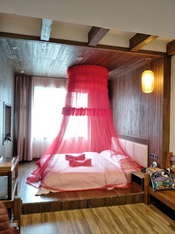Imagen de la habitación del Hotel Zhangjiajie Xiangruige Boutique. Foto 11