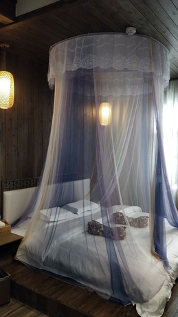 Imagen de la habitación del Hotel Zhangjiajie Xiangruige Boutique. Foto 12