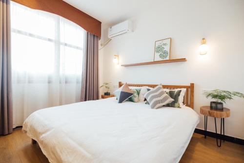 Imagen de la habitación del Hotel Zhangjiajie Zhijue Art. Foto 6