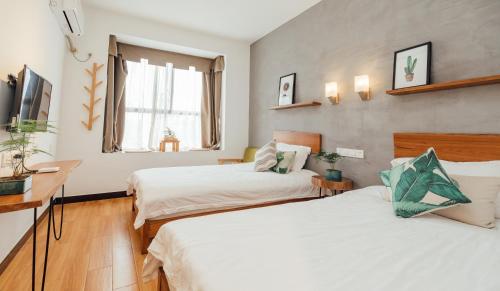 Imagen de la habitación del Hotel Zhangjiajie Zhijue Art. Foto 9