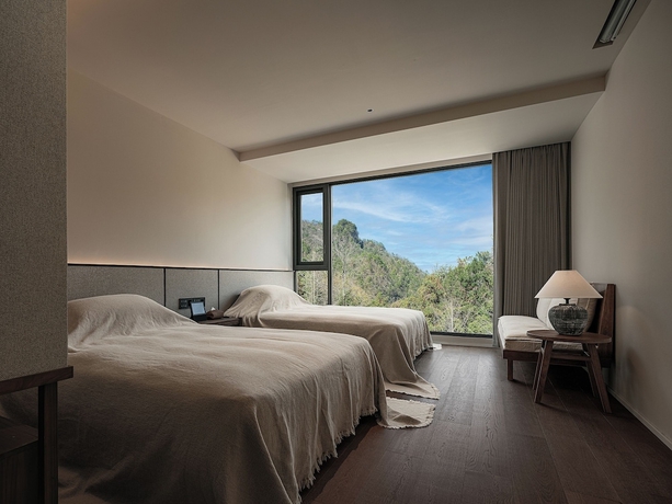 Imagen de la habitación del Hotel Zhangjiajie national park Oxgen Resort. Foto 13
