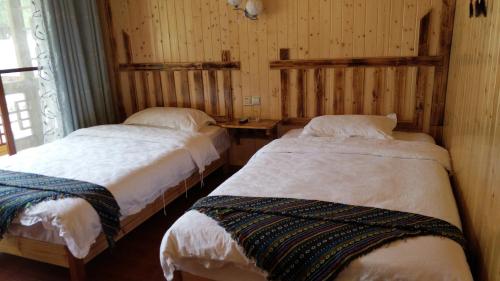 Imagen de la habitación del Hotel Zhangjiajie one step to heaven inn (Yangjiajie ticket office). Foto 8