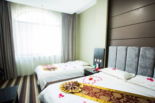 Imagen de la habitación del Hotel Zhangye Xi Xia. Foto 1