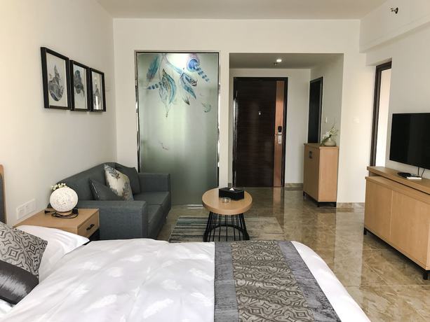 Imagen de la habitación del Hotel Zhanjiang Yuntu Apartment. Foto 7