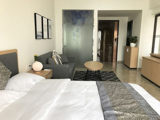 Imagen de la habitación del Hotel Zhanjiang Yuntu Apartment. Foto 9