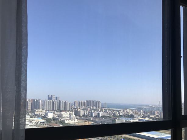 Imagen de la habitación del Hotel Zhanjiang Yuntu Apartment. Foto 14