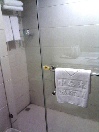 Imagen de la habitación del Hotel Zhanjiang Zhongtailai. Foto 10