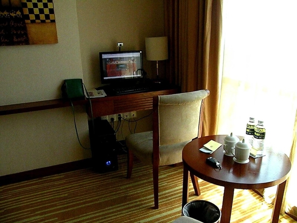 Imagen de la habitación del Hotel Zhanjiang Zhongtailai. Foto 12
