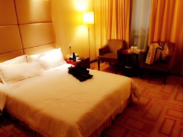 Imagen de la habitación del Hotel Zhanjiang Zhongtailai. Foto 14