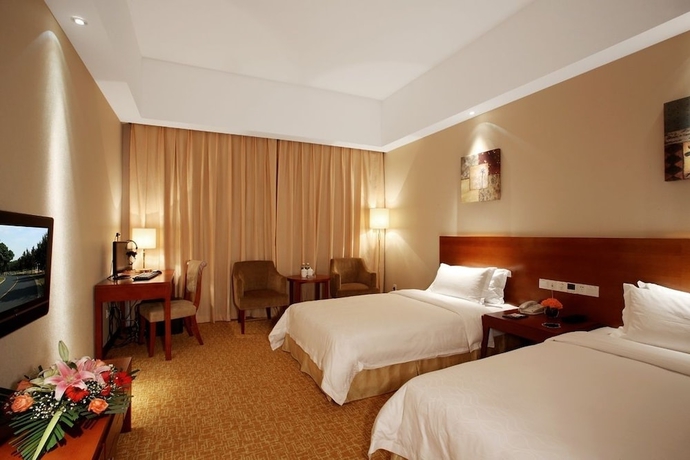 Imagen de la habitación del Hotel Zhanjiang Zhongtailai. Foto 17