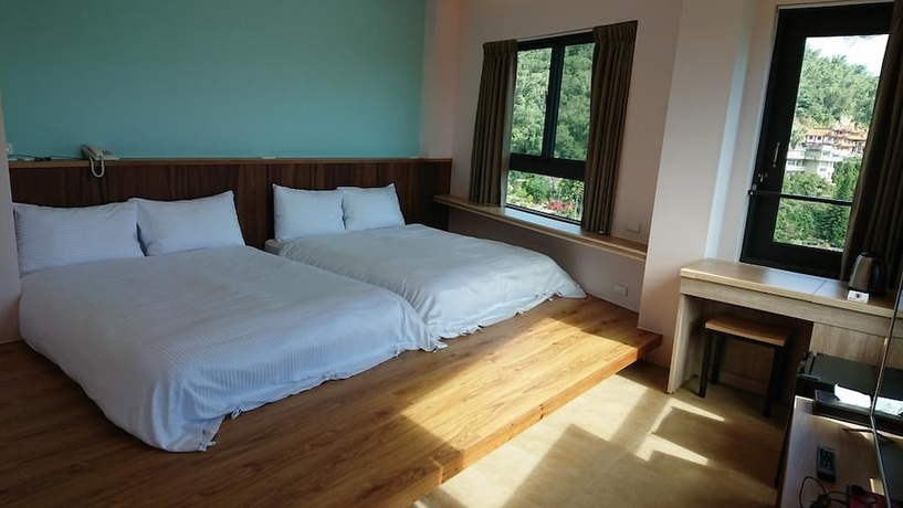 Imagen de la habitación del Hotel Zhao Hong BandB. Foto 5
