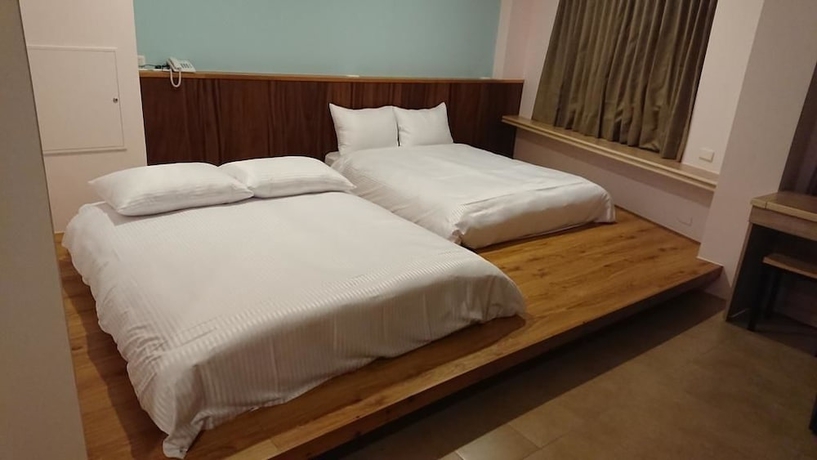 Imagen de la habitación del Hotel Zhao Hong BandB. Foto 6
