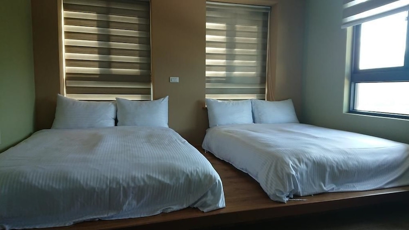 Imagen de la habitación del Hotel Zhao Hong BandB. Foto 7