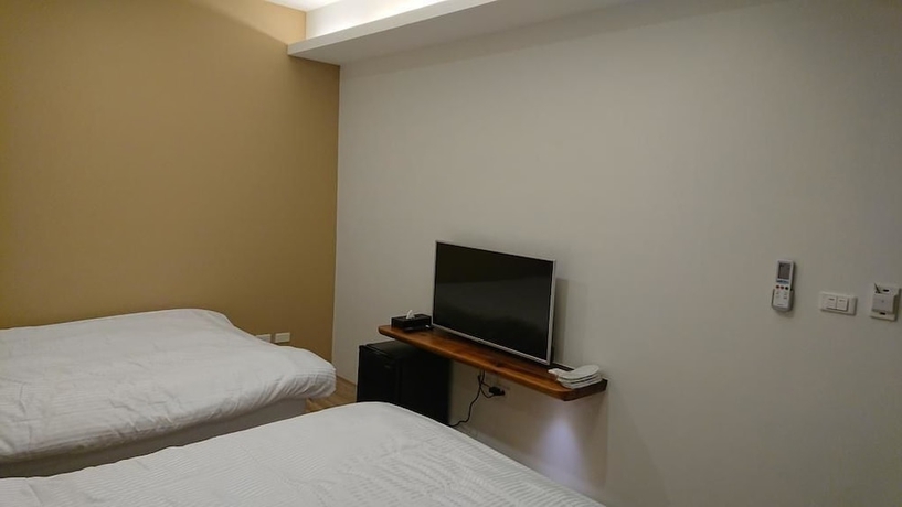 Imagen de la habitación del Hotel Zhao Hong BandB. Foto 10