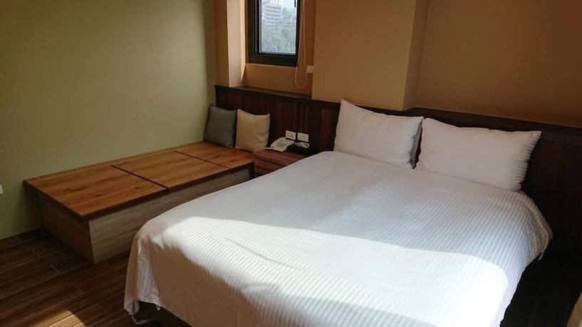 Imagen de la habitación del Hotel Zhao Hong BandB. Foto 11