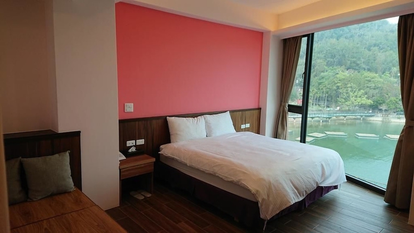 Imagen de la habitación del Hotel Zhao Hong BandB. Foto 14