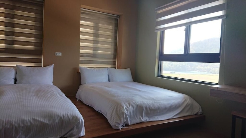 Imagen de la habitación del Hotel Zhao Hong BandB. Foto 15