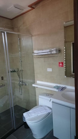 Imagen de la habitación del Hotel Zhao Hong BandB. Foto 16