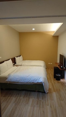 Imagen de la habitación del Hotel Zhao Hong BandB. Foto 17