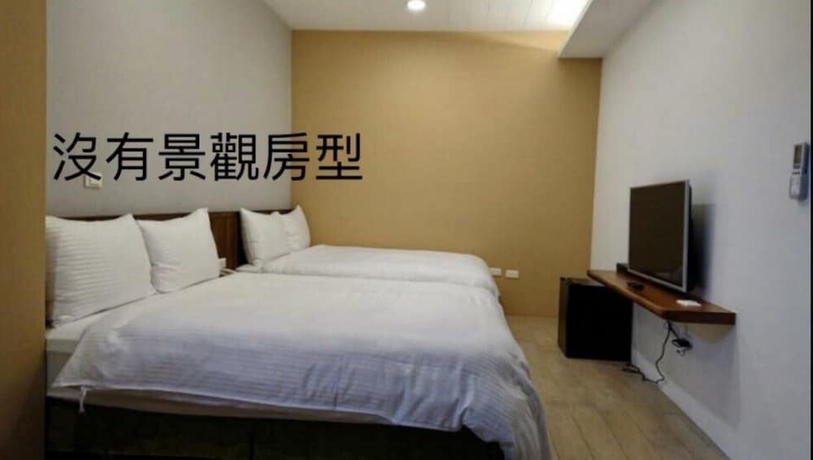 Imagen de la habitación del Hotel Zhao Hong BandB. Foto 18