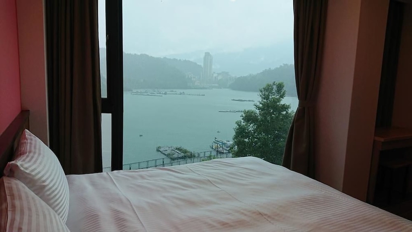 Imagen de la habitación del Hotel Zhao Hong BandB. Foto 19