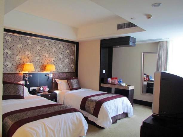 Imagen de la habitación del Hotel Zhao Rui International Hotel Wuhan. Foto 3