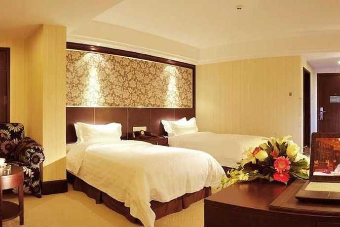 Imagen de la habitación del Hotel Zhao Rui International Hotel Wuhan. Foto 7