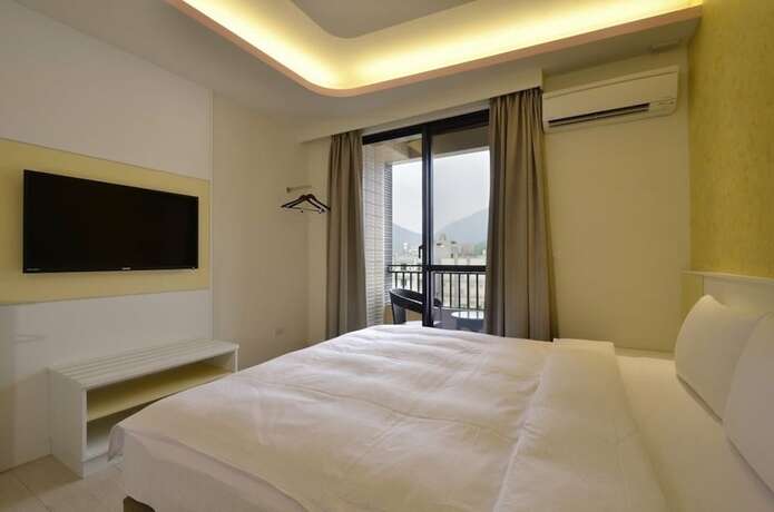 Imagen de la habitación del Hotel Zhaody. Foto 18