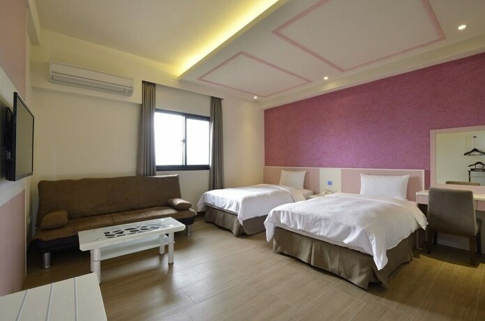 Imagen de la habitación del Hotel Zhaody. Foto 19