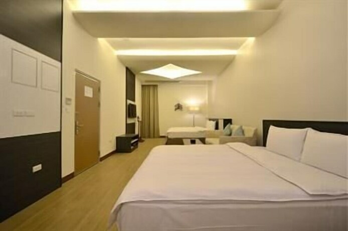 Imagen de la habitación del Hotel Zhaody. Foto 22