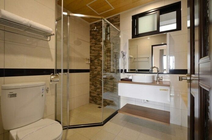 Imagen de la habitación del Hotel Zhaody. Foto 24