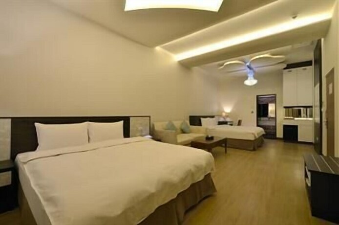 Imagen de la habitación del Hotel Zhaody. Foto 27