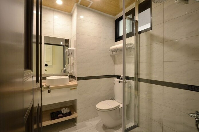 Imagen de la habitación del Hotel Zhaody. Foto 32