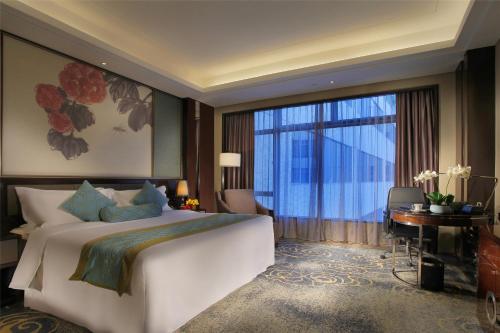 Imagen de la habitación del Hotel Zhaoqing Star. Foto 15