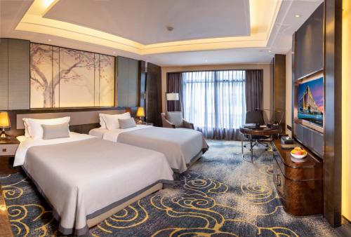 Imagen de la habitación del Hotel Zhaoqing Star. Foto 16