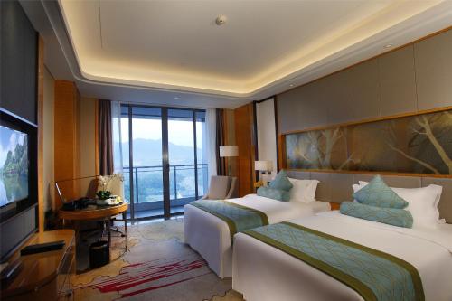 Imagen de la habitación del Hotel Zhaoqing Star. Foto 17