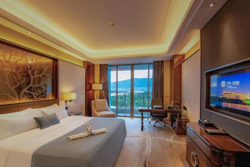 Imagen de la habitación del Hotel Zhaoqing Star. Foto 18