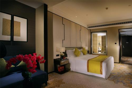 Imagen de la habitación del Hotel Zhaoqing Star. Foto 19