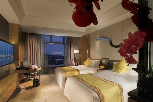Imagen de la habitación del Hotel Zhaoqing Star. Foto 20