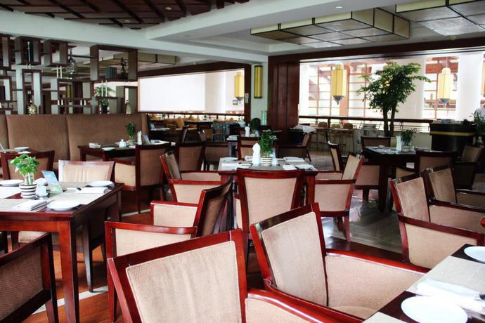 Imagen del bar/restaurante del Hotel Zhejiang Hotel. Foto 3
